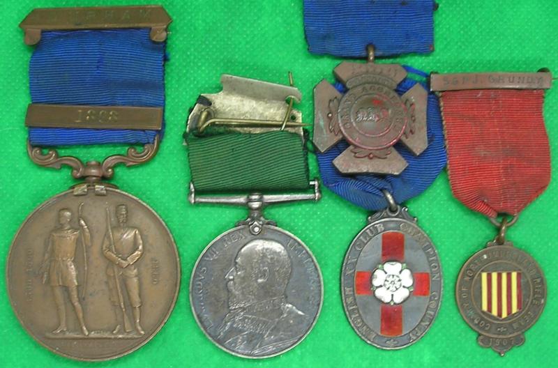 EVII VOLUNTEER MEDAL WITH A SUPERB SELECTION OF SHOOTING MEDALS, 2nd V.B. NORTHUMBERLAND FUSILIERS